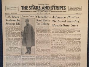 Headline "Advance Parties To Land Sunday, MacArthur Says" from The Stars and Stripes 08/25/1945