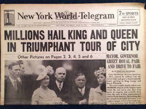Newspaper headline Millions Hail King and Queen In Triumphant Tour Of City from New York World Telegram 06-10-1939